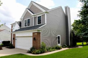 A single family home with gray siding.