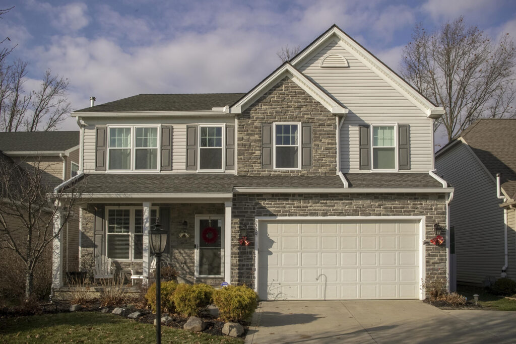 new windows installed on a two story home