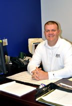 A Universal Windows Direct staff member smiles for the camera.