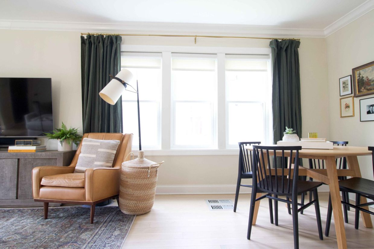 A mid-century modern living room with 3 windows.