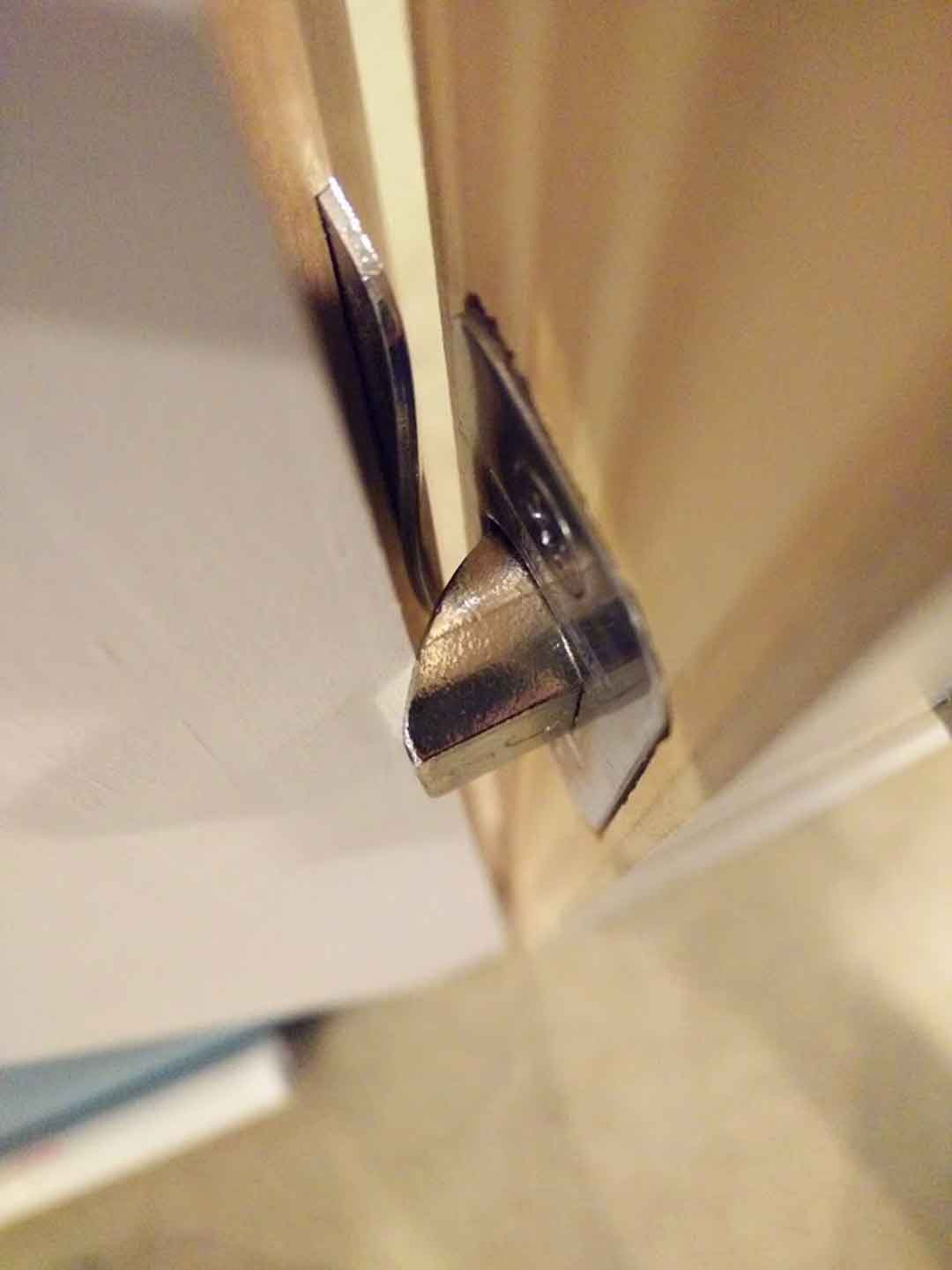 A door won't latch with a misaligned strike plate