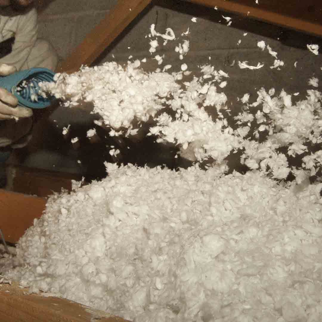 Spray Attic Insulation spray insulation being added to attic