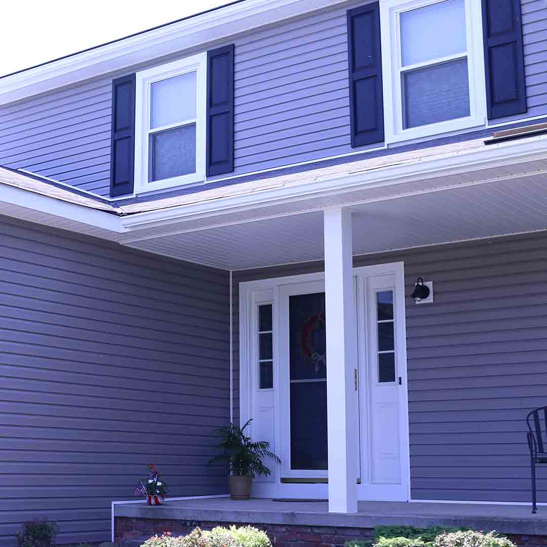 Blue Siding house with blue siding, dark blue shutters