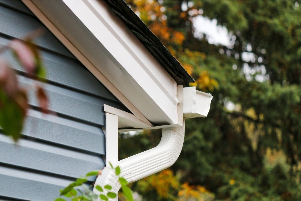 The back side view of a gutter end cap and gutter elbow installed by Universal Windows Direct.