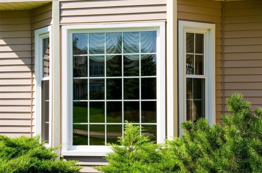 Close up of a grided casement window installed by Universal Windows Direct.