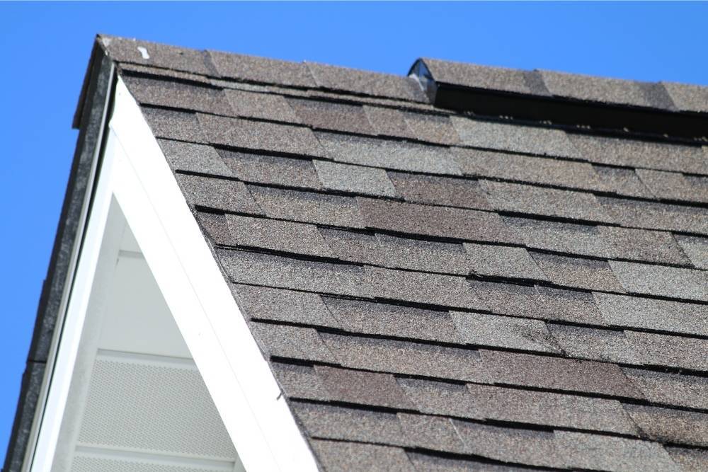 Gray roof shingles installed by Universal Windows Direct.