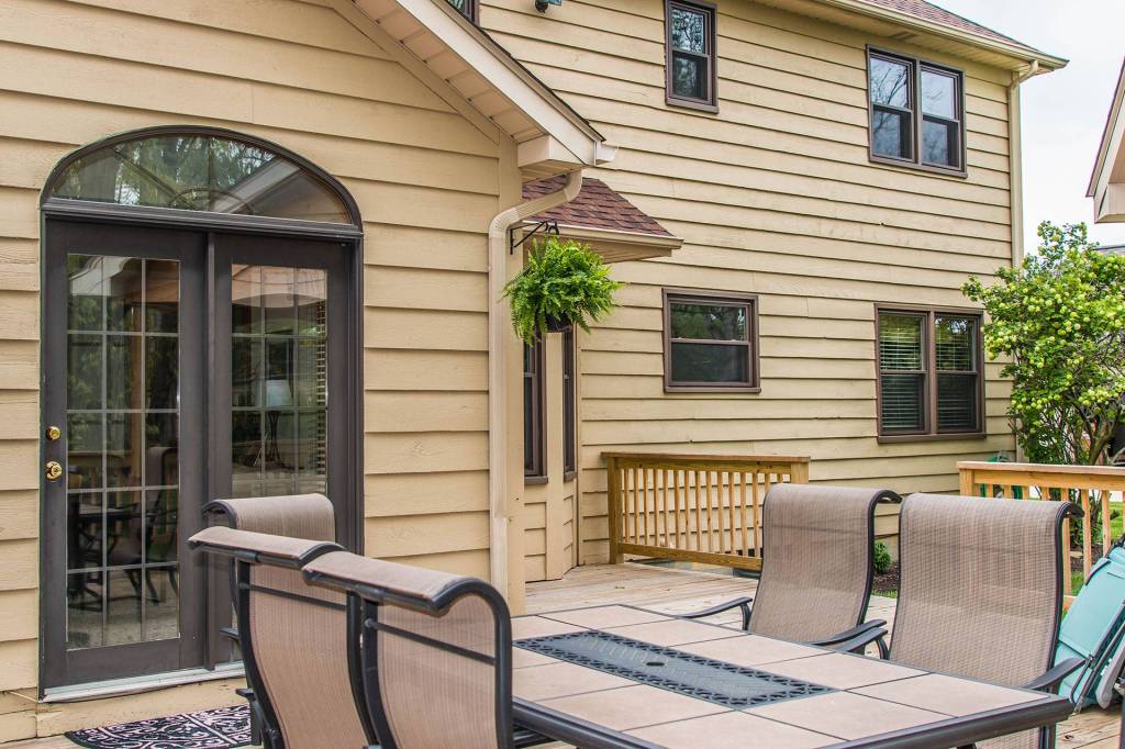 Rear patio with French door and arched transom
