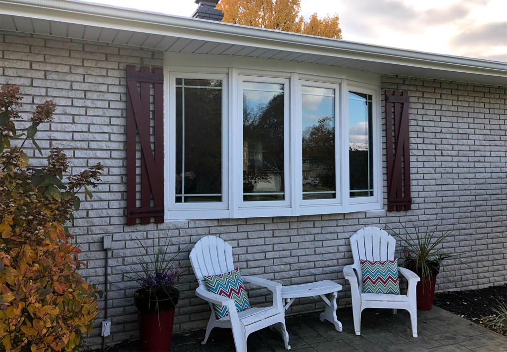 Bow windows from the outside view of a house.